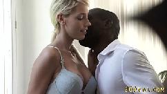 Babe gets interracial cum