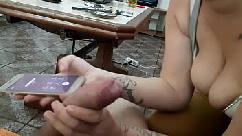 She sucks her while she talks to her boyfriend on the phone