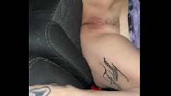 Playing with my pussy in the car at the beach while he watches